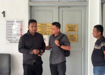ABDULLAH Aqili Romeli, 35 selaku Orang Kena Tuduh (OKT) di Mahkamah Sesyen Sepang di sini, hari ini.