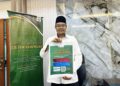 ABD Farid Salleh menunjukkan poster program Nikah Jamaie Syarie 2026 yang akan berlangsung pada 26 Disember pada sidang akhbar di Masjid Sultan Idris Shah II di Ipoh hari ini. -UTUSAN/LIYANA RAMLI