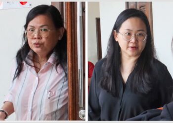 DUA pengarah syarikat pembuatan roda kastor atau besi troli iaitu Lim Hooi Cheng (kiri) dan Karen Lo didakwa atas tujuh pertuduhan iaitu gagal membayar cukai perkhidmatan dan penalti berjumlah RM193,306 ketika dihadapkan ke Mahkamah Sesyen George Town, Pulau Pinang hari ini. - UTUSAN/DANIAL SAAD