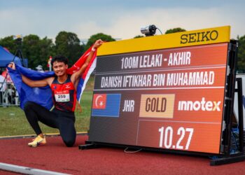 Atlet pecut 100m lelaki Johor, Danish Iftikhar ketika meraikan kemenangan dalam acara akhir lari pecut lelaki 100m sempena Sukan Malaysia (SUKMA) Selangor 2026 di Stadium UPM Serdang di sini, semalam. Gambar ISKANDAR ISHAK