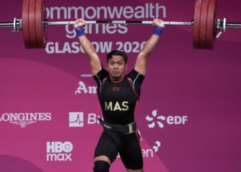 MUHAMMAD Erry Hidayat meraih pingat emas kategori 79 kilogram (kg) pada Sukan Komanwel Glasgow 2026, bulan lalu. - IHSAN MSN