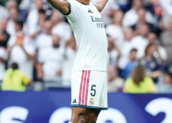 Jude Bellingham meraikan jaringan gol kedua pasukannya menentang Malaga CF dalam saingan La Liga di Santiago Bernabeu, semalam. - AFP