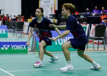 Aaron Tai Wei Qin-Noraqilah Maisarah Ramdan menentang pasangan Kelantan, Kang Khai Xing-Chan Wen Tse dalam acara beregu campuran akhir Sukan Malaysia (SUKMA) 2026 di Pusat Konvensyen Setia City, semalam. - UTUSAN/SHIDDIEQIIN ZON