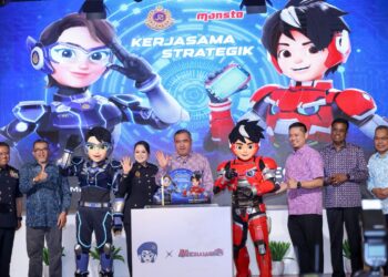 ANTHONY Loke merasmikan pelancaran kerjasama strategik di antara JPJ dan Monsta Studio.di Kementerian Pengangkutan, Putrajaya. - UTUSAN/FAISOL MUSTAFA