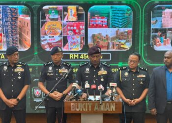 MUHAMMAD Abdul Halim dalam sidang akhbar di Bukit Aman hari ini.