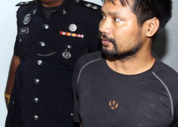 ZAW ZAW AUNG dihadapkan ke Mahkamah Sesyen Ipoh hari ini atas pertuduhan menyeludup tujuh migran warganegara sama di Lebuh Raya Utara-Selatan berhampiran Terowong Menora, bulan lalu.