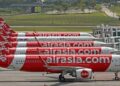 AIRASIA Group membidas laporan yang mendakwa syarikat tersebut memohon bantuan untuk mengumpul dana bernilai sehingga AS$1 bilion. - GAMBAR HIASAN