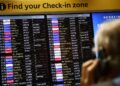 PAPAN daftar masuk elektronik memaparkan senarai penerbangan yang dibatalkan di Terminal 3 Lapangan Terbang London Heathrow, di barat London, susulan gangguan yang menjejaskan sistem kawalan trafik udara NATS.- AFP