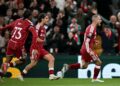 PEMAIN Liverpool, Alexis Mac Allister (kanan) meraikan jaringan kemenangan pada aksi Liga Juara-Juara Eropah menentang Atletico Madrid di Stadium Anfield, awal pagi tadi.-AFP