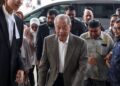 MUHYIDDIN Yassin menghadiri perbicaraan salah guna kedudukan dan pengubahan wang haram berkaitan projek Jana Wibawa di Kompleks Mahkamah Kuala Lumpur, semalam. – UTUSAN/AMIR KHALID