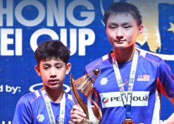 Shahadzryl bergandingan dengan Gan Giap Han untuk menambah koleksi kejuaraan menerusi beregu lelaki selepas menewaskan pasangan Sarawak, Ahmad Aniq Rafiq Mohd Zariffi-Lucas Ho, 15-12, 15-12. IHSAN FB PIALA LCW