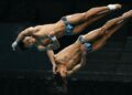 Enrique Harold dan Elvis Priestly Clement melakukan terjunan dalam acara 10 meter platform lelaki Sukan Asia Aichi-Nagoya 2026 Pusat Akuatik Tokyo, semalam. - AFP