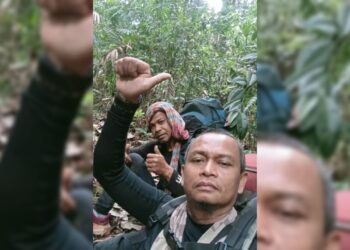 DUA malim gunung terlibat menunjukkan isyarat bagus menerusi gambar yang dihantar kepada rakan mereka semalam.