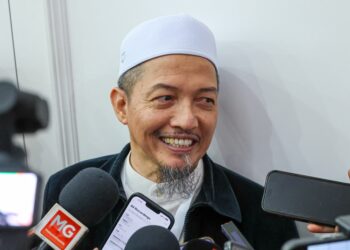 Nik Mohamad Abduh Nik Abdul Aziz Ketika ditemui media selepas Ucapan Dasar Presiden pada PAU, hari ini.- UTUSAN/ISKANDAR ISHAK