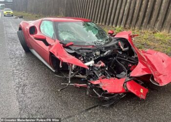 SEBUAH kereta Ferrari rosak teruk selepas pemandunya gagal mengawal kenderaan itu. - Polis Greater Manchester/PA Wire