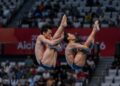 PENERJUN negara, Rui Jie Yong dan Nurqayyum Mohamad beraksi dalam acara akhir 3 meter papan anjal seirama lelaki pada Sukan Asia Aichi-Nagoya 2026 di Pusat Akuatik Tokyo, hari ini. - AFP