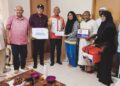 Norkhalid Salim (empat dari kiri) ketika menyerahkan sumbangan UPSI Prihatin kepada Khairina Uwaidah Khairul Nizam di Lumut Perak.