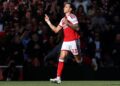 Riccardo Calafiori meledak gol pertama ketika Arsenal menumpaskan Leeds United, semalam.-AFP