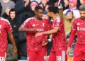 Penyerang Liverpool, Alexander Isak (kiri), meraikan jaringan kedua pasukannya bersama rakan sepasukan ketika menentang Brighton dalam aksi Liga Perdana Inggeris (EPL) di Anfield.-AFP