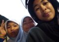 GAMBAR kenangan Elyana Nasuha (depan) bersama dua adiknya, Suhaila (tengah) dan Norhayati Qaliesha (belakang).