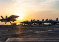 PESAWAT F/A-18 Super Hornet mendarat di atas kapal pengangkut pesawat USS George Washington di Asia Barat.-AFP