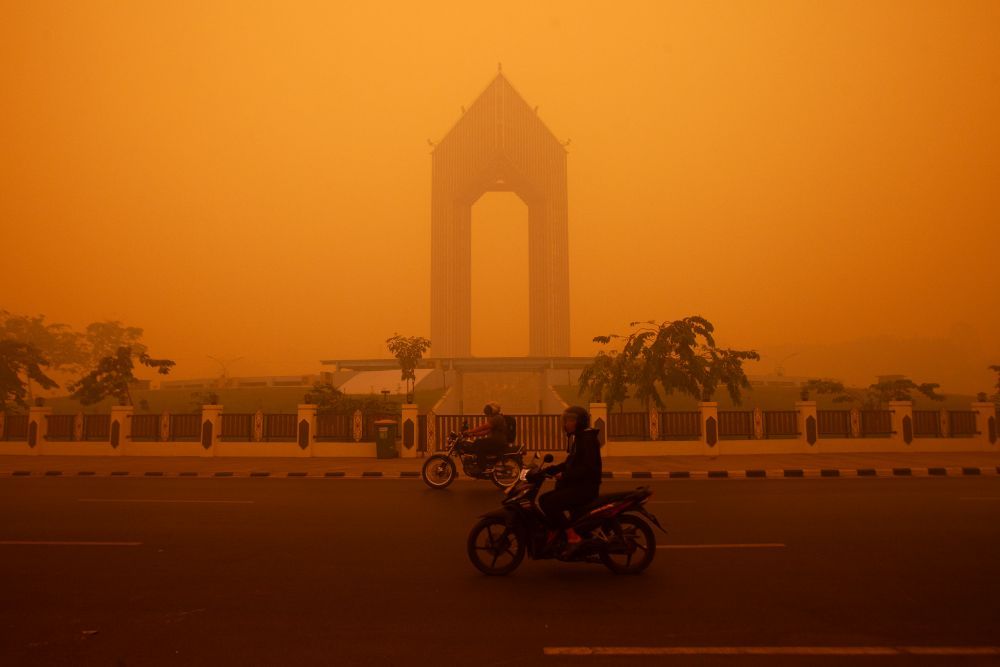 Penduduk hilang sabar jerebu berterusan di Indonesia Penduduk hilang sabar jerebu berterusan di Indonesia