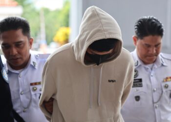 MOHD Iman Nafiz Fong Mohd Sabirin sekali lagi didakwa di Mahkamah Majistret bagi pertuduhan membunuh seorang pekerja penyelenggaraan, Sabtu lalu. - UTUSAN/AMIR KHALID