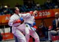 AKSI Adeola Fay Robert (kiri) menentang petarung Uzbekistan, Rakhimova Sevinch dalam kumite kategori 55 kilogram Sukan Asia Aichi-Nagoya 2026, Jepun, baru-baru ini. - IHSAN MSN