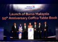 ANWAR Ibrahim (empat kiri) bersama barisan dif kehormat semasa Majlis Pelancaran Coffee Table Book sempena Ulang Tahun Ke-50 Bursa Malaysia, di sini hari ini.