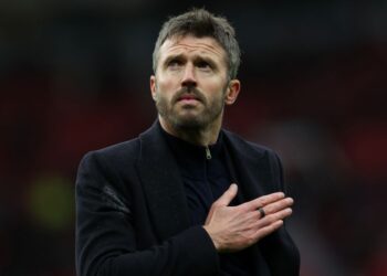 MIchael Carrick masih diberi tanggungjawab mengemudi Manchester United. - AFP