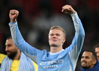 Erling Haaland berpeluang memecahkan rekod jaringan terbanyak oleh pemain dalam 60 penampilan pertama di Liga Juara-Juara jika berjaya merobek gawang PSG. - AFP