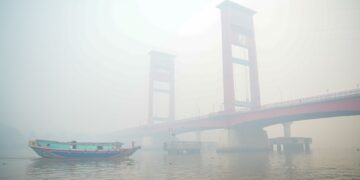 JEREBU melanda Palembang Isnin lalu. - AFP