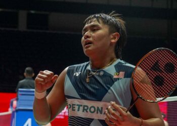 Kang Khai Xing memilih untuk tidak terus menoleh ke belakang selepas terpaksa berpisah dengan gandingannya, Aaron Tai. - UTUSAN