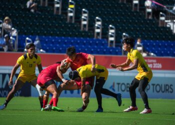 AKSI Skuad ragbi tujuh sebelah (7s) lelaki negara menentang China dalam perlawanan Kumpulan A di Nagoya City Mizuho Park Rugby Field, hari ini.-IHSAN MSN