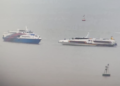 FERI Express Bahagia 98 yang tersangkut pada pukat nelayan sedang dibantu sebuah lagi feri milik Konsortium Langkawi Ferry Line Ventures di perairan Kuala Perlis.