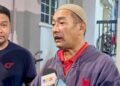 AMRAN Ibrahim ketika ditemui pemberita di Kuarters KLIA, Nilai, Seremban awal pagi tadi. - UTUSAN/NOR SHAFIQAH MOHD. GHAZALI