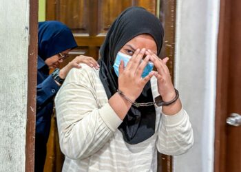 NURFITRAH Mohd. Raziff mengaku tidak bersalah ketika dihadapkan ke Mahkamah Sesyen Butterworth, Pulau Pinang atas pertuduhan mengabaikan seorang bayi lelaki berusia 10 bulan sehingga menyebabkan kematian, minggu lepas.-UTUSAN/DANIAL SAAD