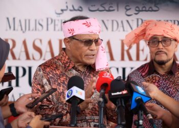 MOHD. Dusuki Mokhtar semasa sidang media selepas Perasmian dan Penyerahan Projek Kampung Angkat Madani Jabatan Peguam Negara 2026 di Dataran Warisan, Kok Lanas, Ketereh, Kelantan hari ini-UTUSAN/KAMARUL BISMI KAMARUZAMAN