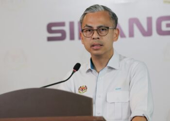 FAHMI Fadzil semasa sidang akhbar pasca mesyuarat Kabinet di Putrajaya semalam.-BERNAMA.
