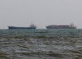 GAMBAR fail dua kapal dagang belayar di Selat Hormuz. - AFP