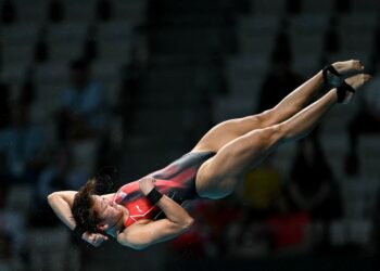 Pandelela Rinong melakukan terjunan semasa mengambil bahagian dalam Sukan Asia Aichi-Nagoya 2026 di Tokyo, Jepun, baru-baru ini. - AFP