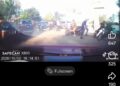 TANGKAP layar memaparkan seorang penunggang motosikal terjatuh selepas dipercayai ditendang individu dalam kejadian di Pantai Sri Tujoh, Tumpat, Kelantan.