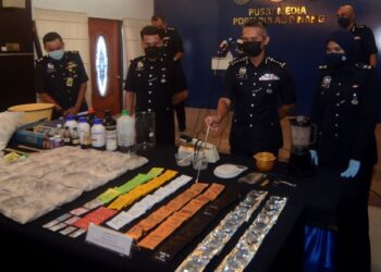 MOHD. SHUHAILY MOHD. ZAIN menunjukkan sebahagian dadah yang dirampas polis daripada beberapa sindiket dalam sidang akhbar di Ibu Pejabat Polis Kontinjen (IPK) Pulau Pinang hari ini.
