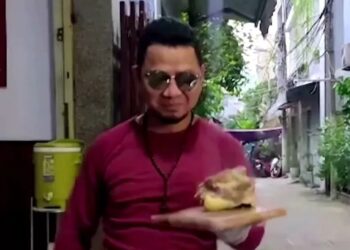 BUI Tuan Lam ditahan polis Vietnam selepas meniru gaya Salt Bae dalam video parodinya.-AGENSI