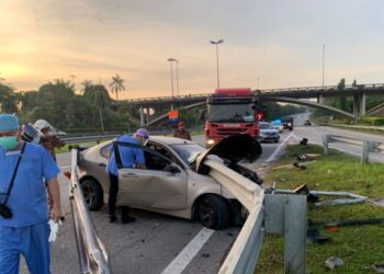 KEADAAN kemalangan maut di Kilometer 37.9 Persiaran Utama menghala ke Puchong, Selangor. -IHSAN IPD SEPANG