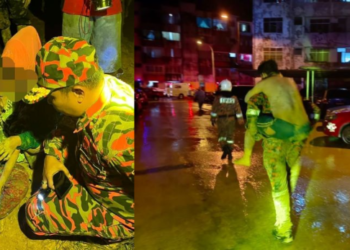 PASUKAN Bomba menyelamatkan mangsa yang cedera akibat tanah runtuh yang berlaku di Kota Kinabalu.