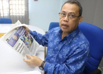 ABDUL FATTAH Abdullah mengulas laporan Utusan Malaysia bertajuk 'RM100 bilion kos import makanan' dan peranan gerakan koperasi dalam membantu pengeluaran makanan negara di Temerloh, Pahang. - UTUSAN/ SALEHUDIN MAT RASAD