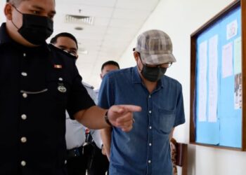 NG Kok Chai,46 hadir ke Mahkamah Majistret Klang, Selangor pada hari ini. - UTUSAN / ZULFADHLI ZAKI