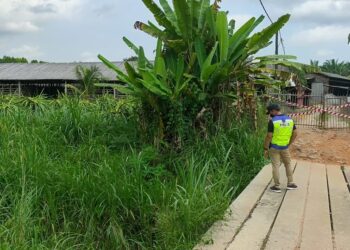 SEBUAH ladang babi yang ditutup dan dikawal pihak berkuasa susulan berlakunya jangkitan wabak ASF di Kampung Baru Site A, Tanah Merah, Lukut, Port Dickson.