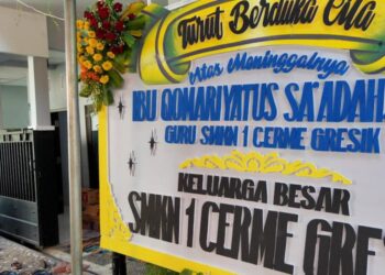 SUASANA rumah mangsa yang maut akibat diragut di Surabaya.-KOMPAS